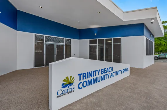 Trinity beach Community Hall building with a sign